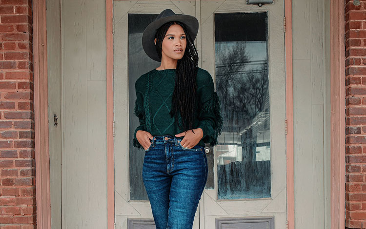 Women standing in front of a door. Visit southernstylesandsteeds.com